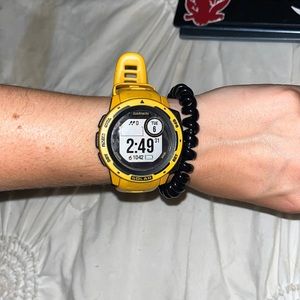 Yellow/ Orange/ Gold Garmin instinct, solar. bought in 2021, like new